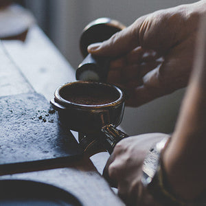 Barista Making Decaf Espresso Coffee